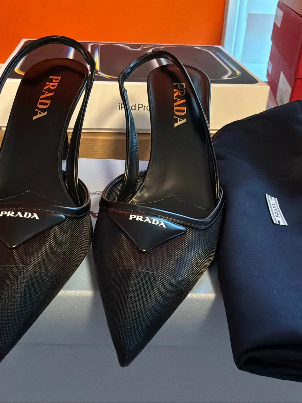 Prada Black Pointed Slingback Pumps with Logo Plaque